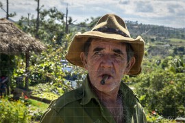 Отрудените лица на Куба с неизменната пура в уста (NCH_8440)